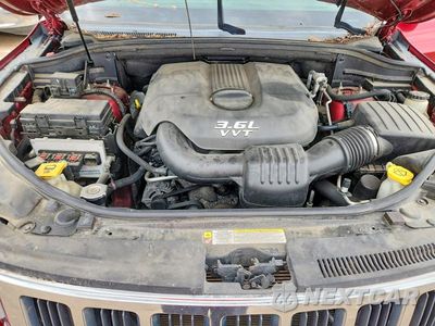 Zdjęcie 12 z 13 samochodu: 2012 JEEP GRAND CHEROKEE VIN:1C4RJFAG7CC182477 - miniatura