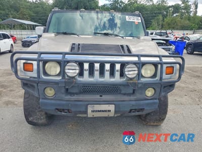 Piąte zdjęcie samochodu w środku: 2003 HUMMER H2 VIN:5GRGN23UX3H145531 - miniatura