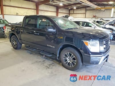 Czwarte zdjęcie samochodu z boku: 2023 NISSAN TITAN SV VIN:1N6AA1ED4PN100261 - miniatura