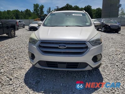 Piąte zdjęcie samochodu w środku: 2017 FORD ESCAPE TITANIUM VIN:1FMCU0JD4HUD24328 - miniatura
