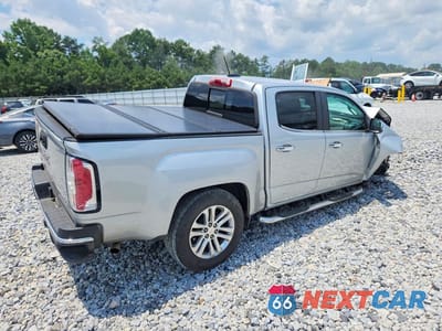 Trzecie zdjęcie samochodu z tyłu: 2016 GMC CANYON SLT VIN:1GTG5DE30G1373828 - miniatura