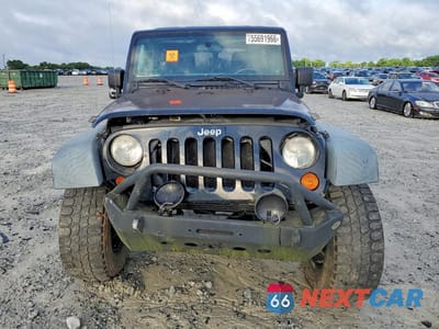 Piąte zdjęcie samochodu w środku: 2011 JEEP WRANGLER UNLIMITED SPORT VIN:1J4HA3H11BL500680 - miniatura