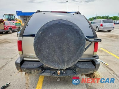Zdjęcie 6 z 12 samochodu: 2003 CHEVROLET BLAZER VIN:1GNCT18X93K169848 - miniatura
