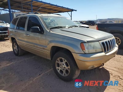 Czwarte zdjęcie samochodu z boku: 2001 JEEP GRAND CHEROKEE LIMITED VIN:1J4GW58N81C680959 - miniatura