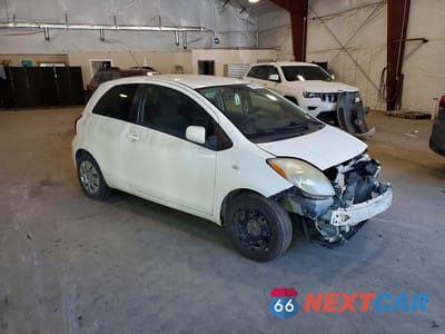 Czwarte zdjęcie samochodu z boku: 2007 TOYOTA YARIS BASE VIN:JTDJT923X75054748 - miniatura