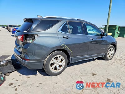 Trzecie zdjęcie samochodu z tyłu: 2018 CHEVROLET EQUINOX LT VIN:3GNAXKEX9JS565723 - miniatura