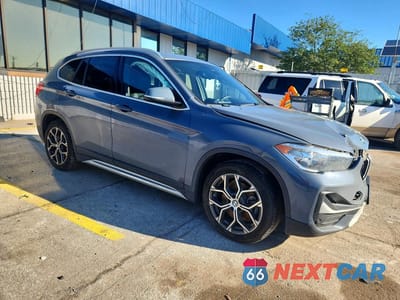 Czwarte zdjęcie samochodu z boku: 2021 BMW X1 XDRIVE28I VIN:WBXJG9C07M3M76687 - miniatura