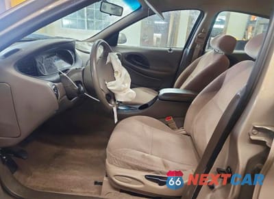 Zdjęcie 7 z 12 samochodu: 1999 FORD TAURUS SE VIN:1FAFP53S3XG214293 - miniatura