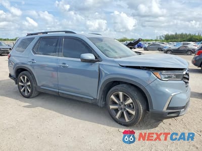Czwarte zdjęcie samochodu z boku: 2025 HONDA PILOT TOURING VIN:5FNYG2H74SB010532 - miniatura