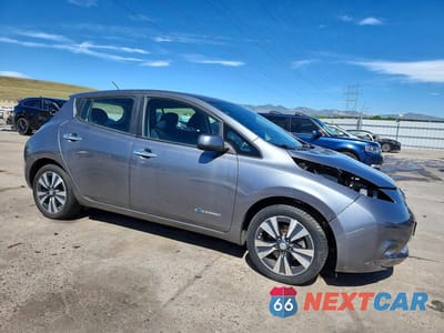 Czwarte zdjęcie samochodu z boku: 2015 NISSAN LEAF S VIN:1N4AZ0CP3FC327802 - miniatura