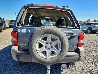 Zdjęcie 6 z 14 samochodu: 2002 JEEP LIBERTY SPORT VIN:1J4GL48K82W179336 - miniatura