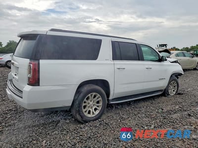 Trzecie zdjęcie samochodu z tyłu: 2019 GMC YUKON XL K1500 SLT VIN:1GKS2GKC1KR345804 - miniatura