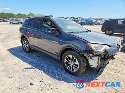 Czwarte zdjęcie samochodu z boku: 2016 TOYOTA RAV4 HV XLE VIN:JTMRJREV3GD007833 - miniatura