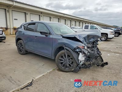 Czwarte zdjęcie samochodu z boku: 2023 MAZDA CX-5 PREFERRED VIN:JM3KFBCM1P0233176 - miniatura