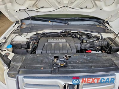 Zdjęcie 12 z 13 samochodu: 2007 HONDA PILOT LX VIN:5FNYF18107B001990 - miniatura