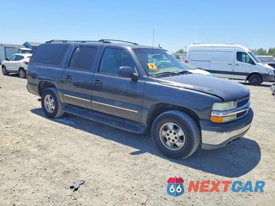 Czwarte zdjęcie samochodu z boku: 2003 CHEVROLET SUBURBAN K1500 VIN:3GNFK16T53G223864 - miniatura