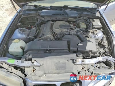 Zdjęcie 11 z 12 samochodu: 1997 BMW 318 IC VIN:WBABH7326VEY02406 - miniatura