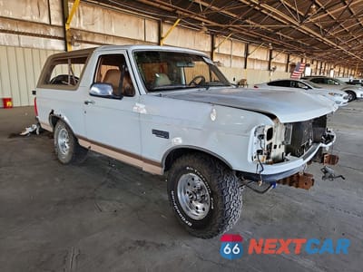 Czwarte zdjęcie samochodu z boku: 1996 FORD BRONCO U100 VIN:1FMEU15H0TLB72784 - miniatura