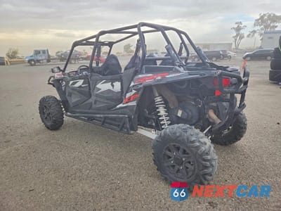 Trzecie zdjęcie samochodu z tyłu: 2016 POLARIS RZR TURBO XP UTILITY VEHICLE VIN:3NSVFE923GF467459 - miniatura