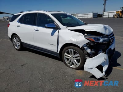 Czwarte zdjęcie samochodu z boku: 2018 CHEVROLET EQUINOX PREMIER VIN:2GNAXNEX8J6282603 - miniatura