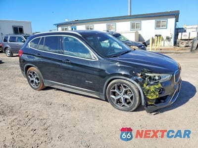 Czwarte zdjęcie samochodu z boku: 2017 BMW X1 XDRIVE28I VIN:WBXHT3C37H5F69319 - miniatura