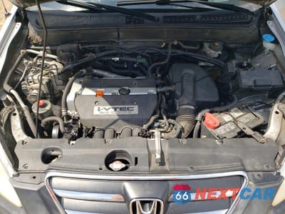 Zdjęcie 12 z 13 samochodu: 2005 HONDA CR-V EX VIN:SHSRD78875U328838 - miniatura