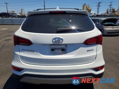 Zdjęcie 6 z 13 samochodu: 2018 HYUNDAI SANTA FE SPORT 2.4L VIN:5NMZU3LB3JH052816 - miniatura