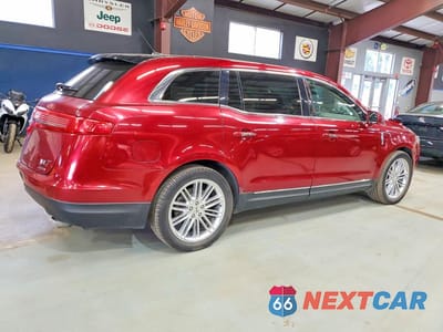 Trzecie zdjęcie samochodu z tyłu: 2016 LINCOLN MKT VIN:2LMHJ5AT7GBL02674 - miniatura