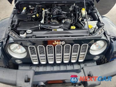 Zdjęcie 12 z 13 samochodu: 2016 JEEP WRANGLER UNLIMITED SAHARA VIN:1C4BJWEG7GL162814 - miniatura