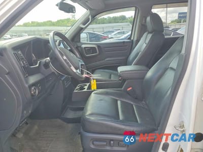 Zdjęcie 7 z 12 samochodu: 2014 HONDA RIDGELINE RTL-S VIN:5FPYK1F6XEB014048 - miniatura