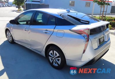 Czwarte zdjęcie samochodu z boku: 2018 TOYOTA PRIUS THREE VIN:JTDKARFU0J3067881 - miniatura