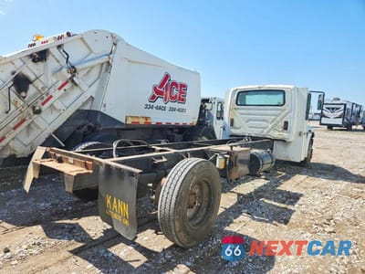 Czwarte zdjęcie samochodu z boku: 2006 INTERNATIONAL 4300 REFUSE TRUCK VIN:1HTMMAAR26H339476 - miniatura