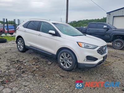 Czwarte zdjęcie samochodu z boku: 2019 FORD EDGE TITANIUM VIN:2FMPK3K93KBB52390 - miniatura