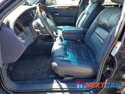 Zdjęcie 7 z 12 samochodu: 2001 LINCOLN TOWN CAR SIGNATURE VIN:1LNHM82W51Y612622 - miniatura