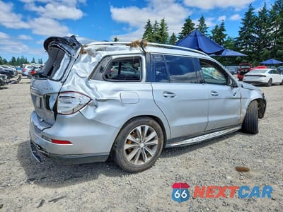 Trzecie zdjęcie samochodu z tyłu: 2013 MERCEDES-BENZ GL 450 4MATIC VIN:4JGDF7CE9DA196077 - miniatura