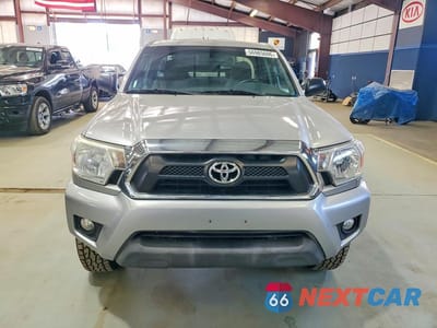 Piąte zdjęcie samochodu w środku: 2014 TOYOTA TACOMA V6 VIN:5TFUU4EN0EX106609 - miniatura