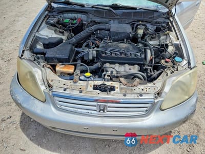 Zdjęcie 11 z 12 samochodu: 1999 HONDA CIVIC LX VIN:1HGEJ6670XL015490 - miniatura