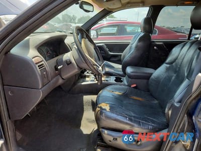 Zdjęcie 7 z 12 samochodu: 2000 JEEP GRAND CHEROKEE LAREDO VIN:1J4GW48S9YC235270 - miniatura