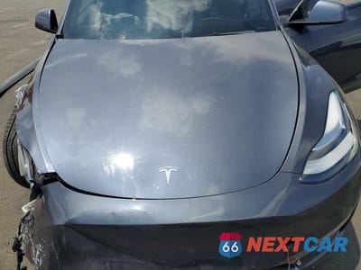 Zdjęcie 12 z 14 samochodu: 2022 TESLA MODEL Y VIN:7SAYGDEE7NF369878 - miniatura
