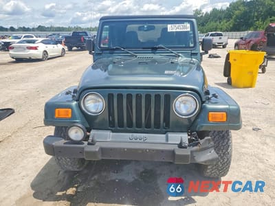 Piąte zdjęcie samochodu w środku: 2004 JEEP WRANGLER / TJ SAHARA VIN:1J4FA59S64P768436 - miniatura