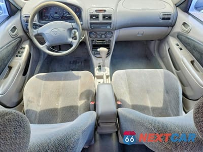 Zdjęcie 8 z 12 samochodu: 2001 TOYOTA COROLLA LE VIN:1NXBR12E31Z462930 - miniatura