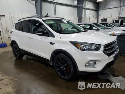 Czwarte zdjęcie samochodu z boku: 2017 FORD ESCAPE TITANIUM VIN:1FMCU9J98HUA26607 - miniatura