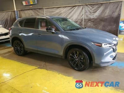 Czwarte zdjęcie samochodu z boku: 2022 MAZDA CX-5 PREFERRED VIN:JM3KFBCM3N0548378 - miniatura