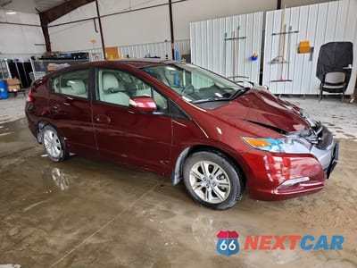 Czwarte zdjęcie samochodu z boku: 2011 HONDA INSIGHT EX VIN:JHMZE2H7XBS009428 - miniatura