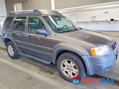 Czwarte zdjęcie samochodu z boku: 2003 FORD ESCAPE VIN:1FMCU93153KC34942 - miniatura