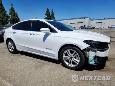 Czwarte zdjęcie samochodu z boku: 2018 FORD FUSION SE HYBRID VIN:3FA6P0LU4JR172110 - miniatura