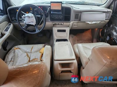 Zdjęcie 8 z 14 samochodu: 2002 GMC YUKON VIN:1GKEC13Z12J235540 - miniatura