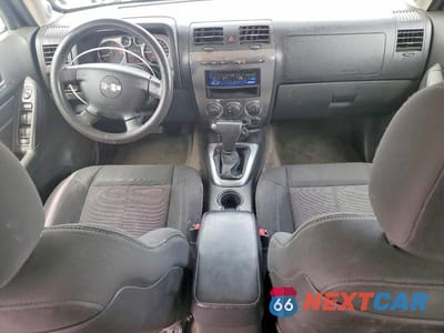 Zdjęcie 8 z 12 samochodu: 2009 HUMMER H3 VIN:5GTEN13E498135333 - miniatura