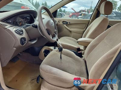 Zdjęcie 7 z 12 samochodu: 2003 FORD FOCUS SE COMFORT VIN:1FAFP34363W113907 - miniatura