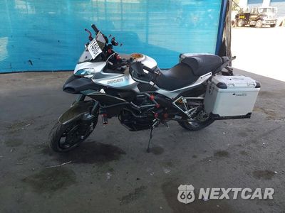 Trzecie zdjęcie samochodu z tyłu: 2013 DUCATI MULTISTRADA 1200 VIN:ZDM12BSW5DB000490 - miniatura